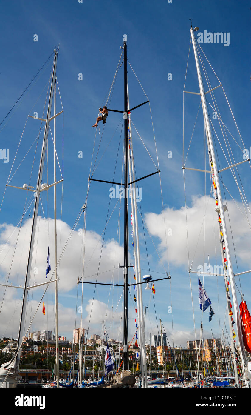 Climbing yacht mast Stock Photo Alamy