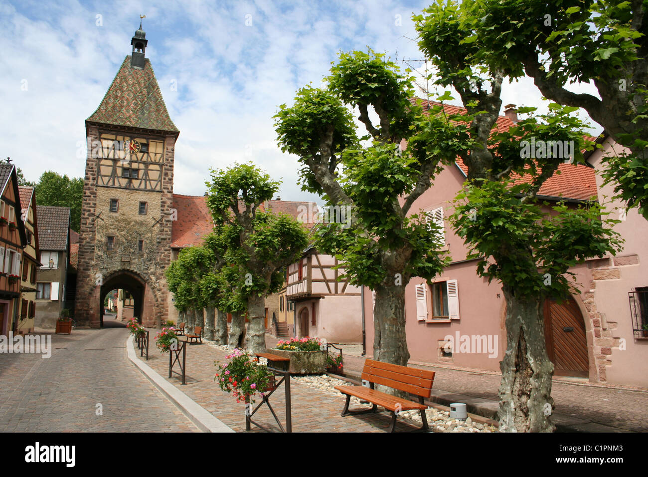 France. Ancient bell tower in the Alsace region, France. Shows its historical location on the west bank of the Upper Rhine. Stock Photo
