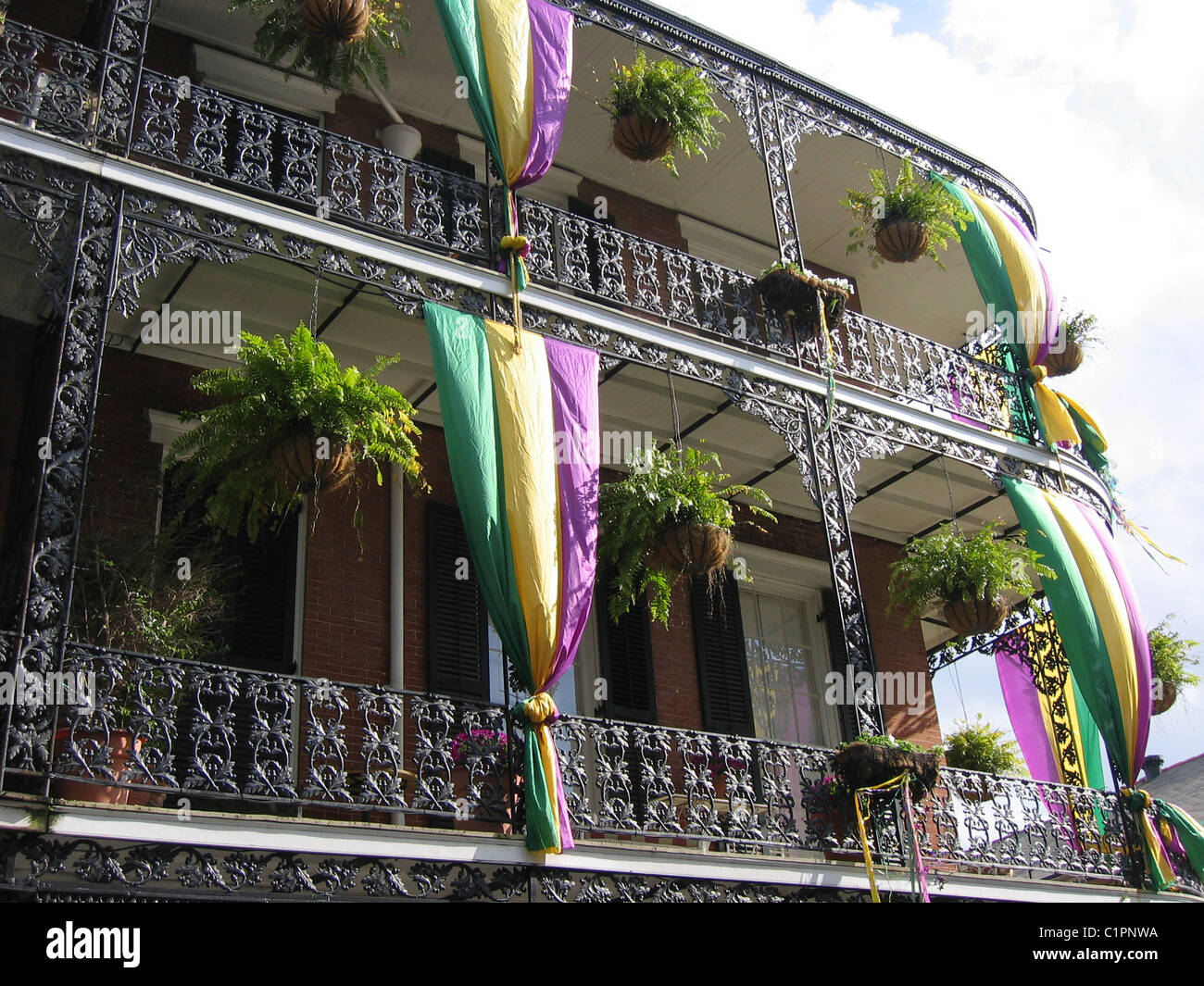 Iron railings decked in coloured ribbons celebrating Mardi Gras, New Orleans, USA. Stock Photo