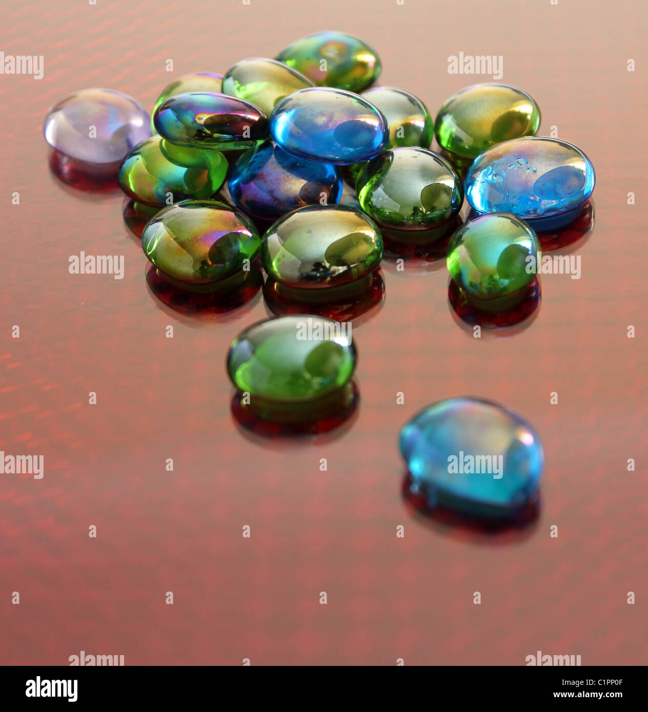 Glass beads spread across a festive layer Stock Photo