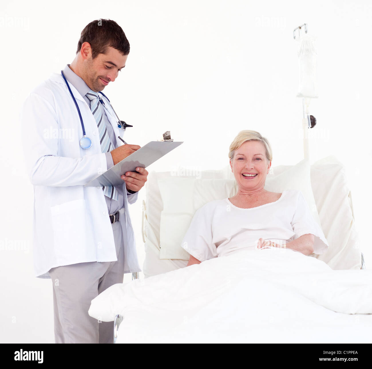 Female patient with handsome doctor Stock Photo - Alamy