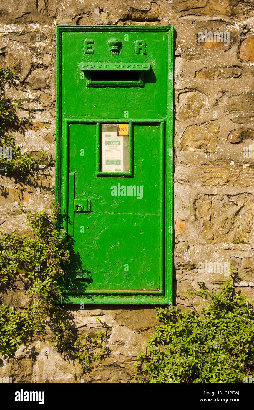 Republic of Ireland, Boyne Valley, Kells, green letterbox set in stone wall Stock Photo