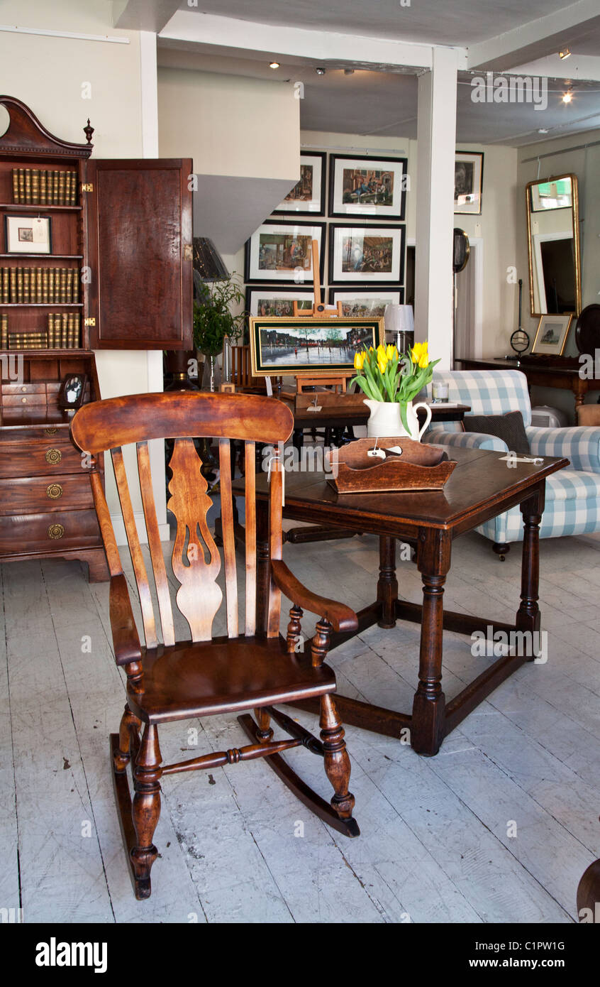 Inside an antique shop in the provincial English town of Warminster in Wiltshire, England, UK Stock Photo