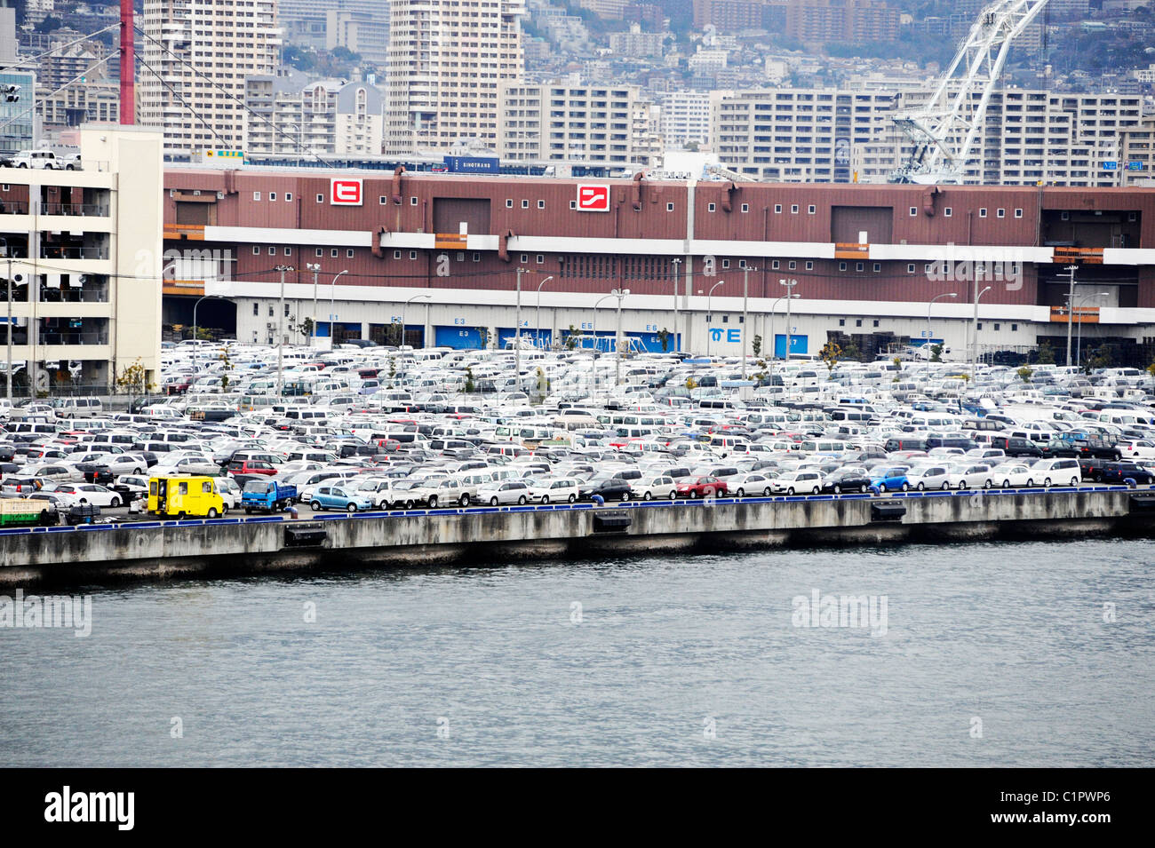 A mass of cars parked at the Port of Kobe dockside, Japan Stock Photo