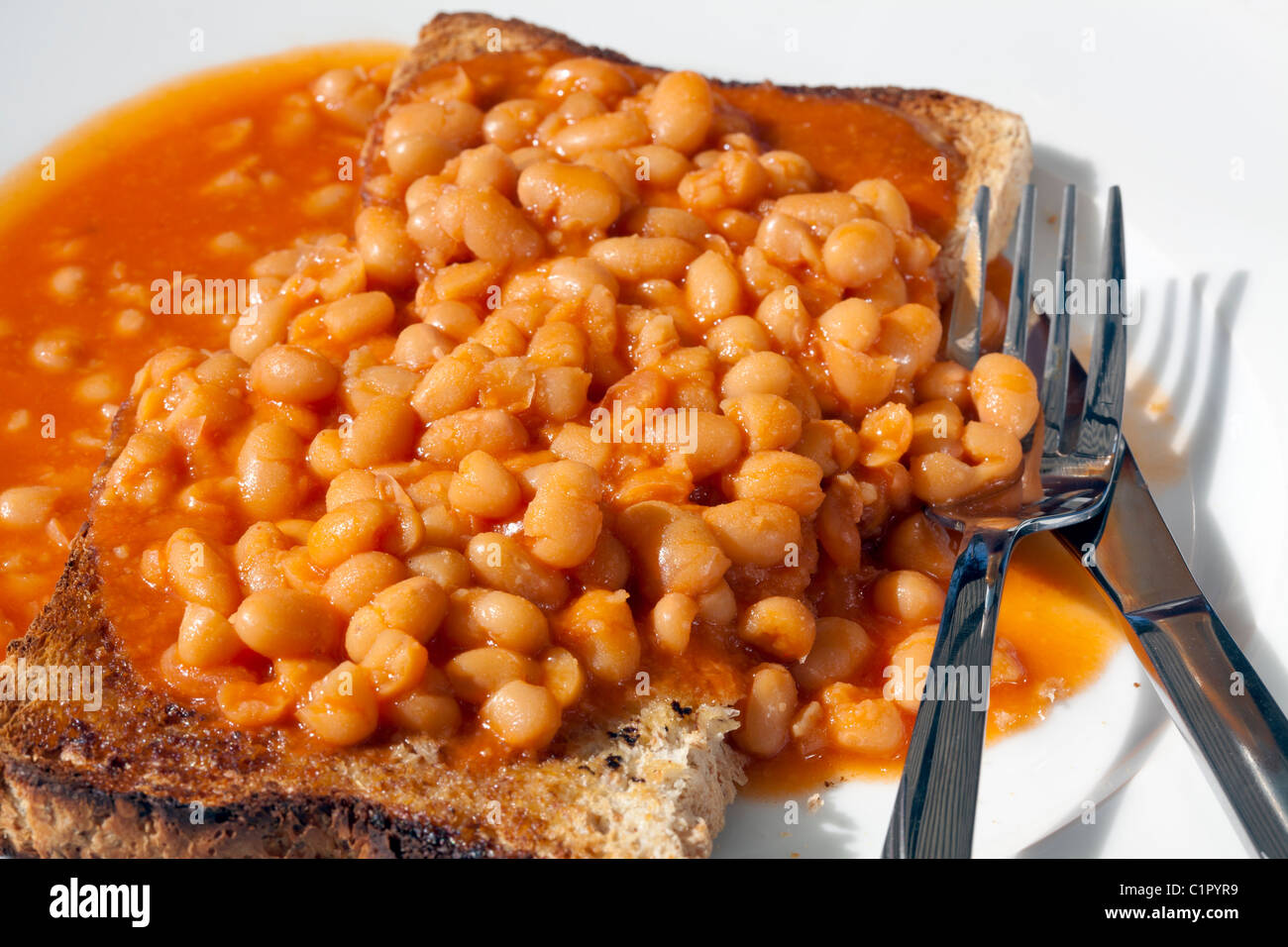 Baked beans on toast Stock Photo