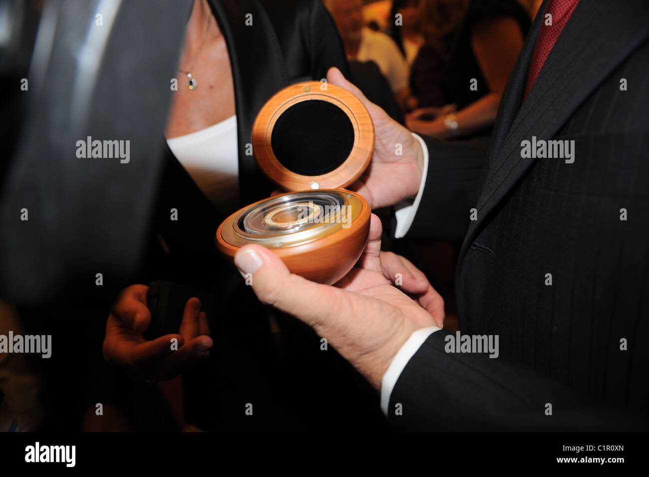 Karel Gott with a present from Vaclav Havel 70th birthday party for