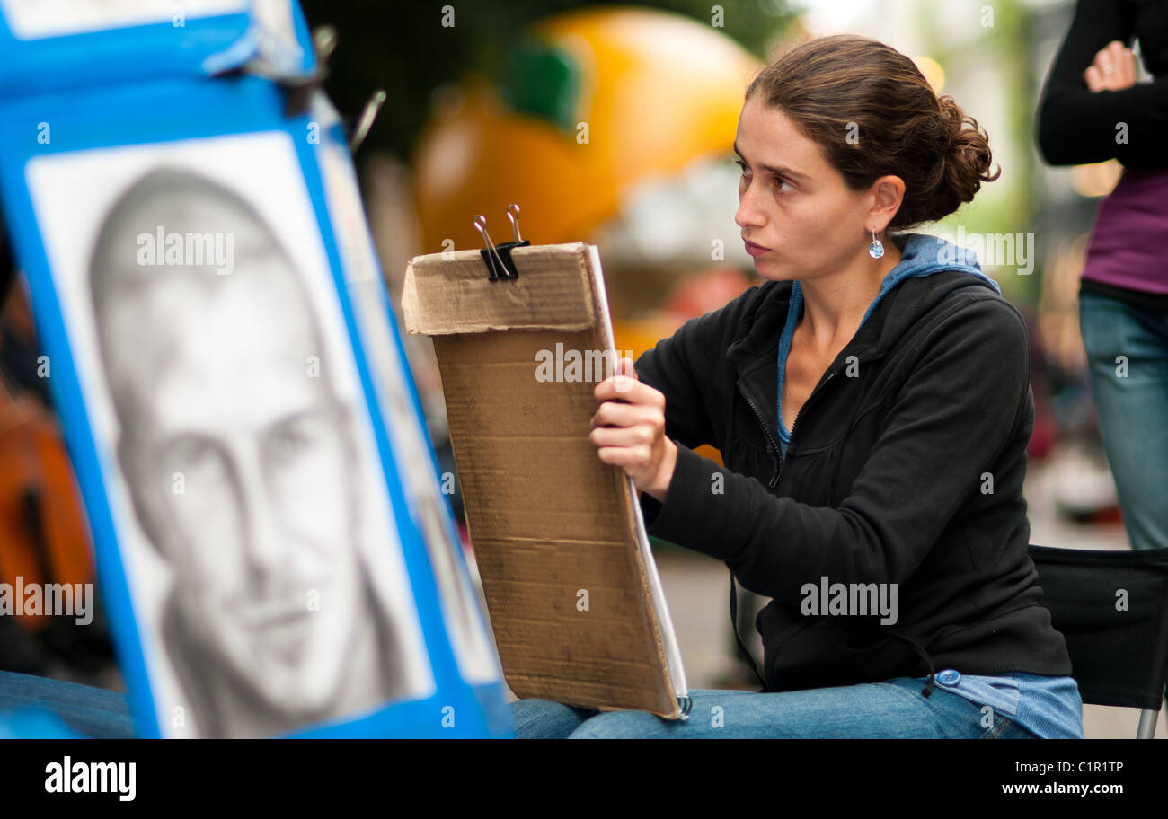 An artist making portraits in the streets of Copenhagen Stock Photo Alamy
