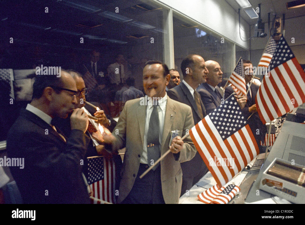 Celebrating Apollo 11 NASA and Manned Spacecraft Center (MSC) officials joined with flight controllers to celebrate landing Stock Photo