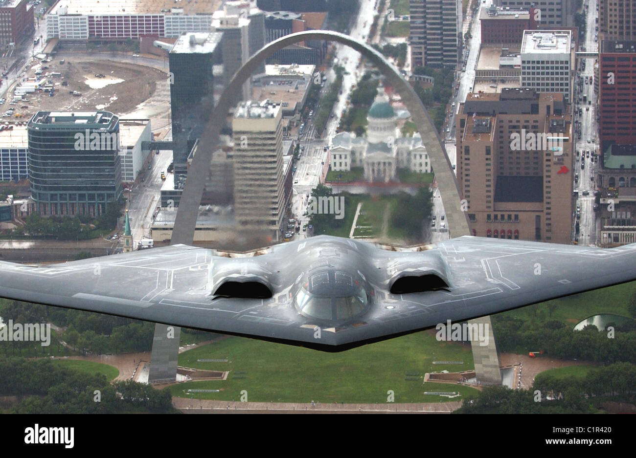 B2 Stealth Bomber with the 509th Bomb Wing flies over the St. Louis Arch during Air Force week. Stock Photo