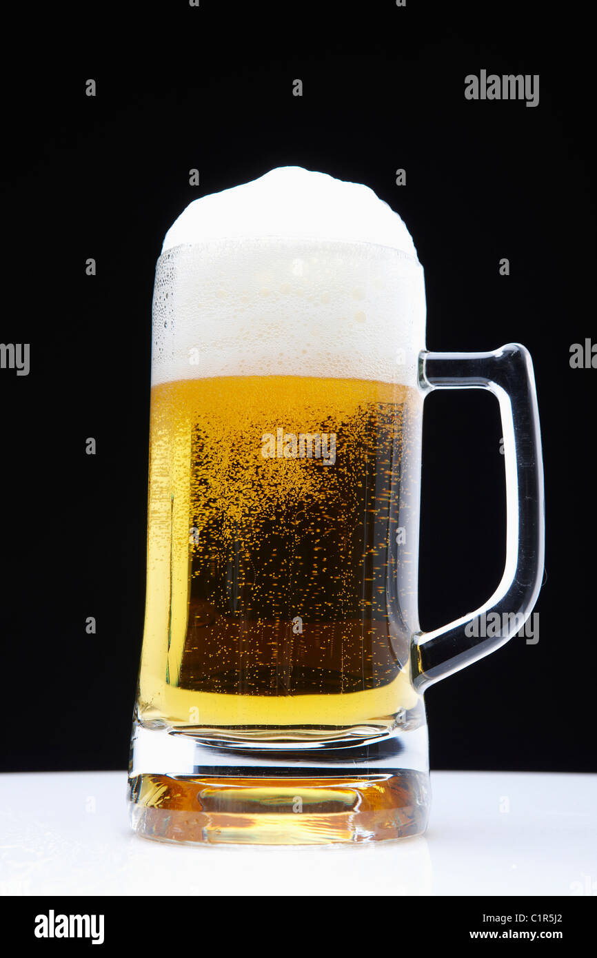 draft beer with foams Stock Photo Alamy