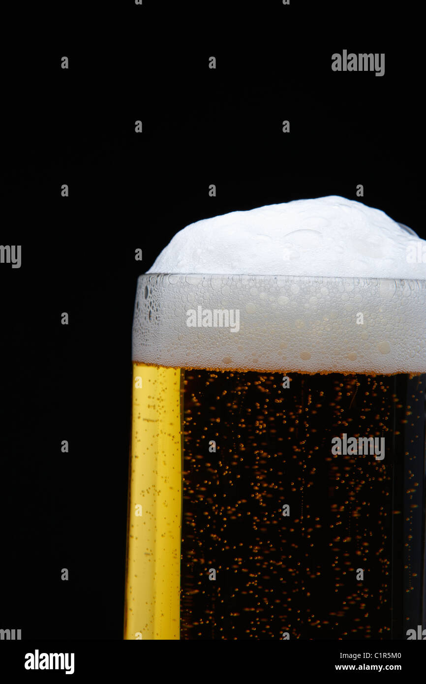draft beer with foams Stock Photo Alamy