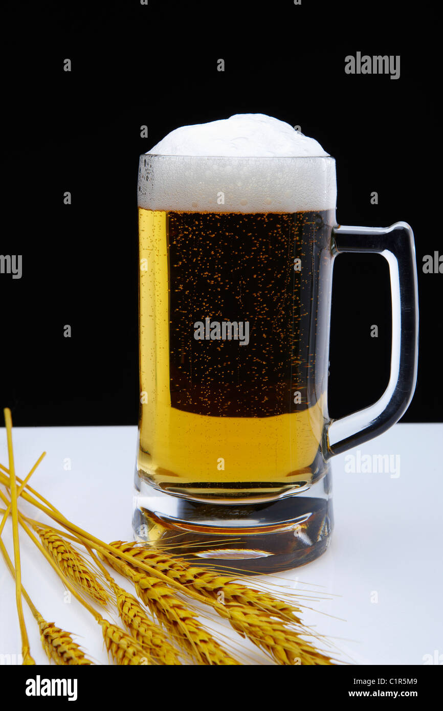 draft beer with foams Stock Photo Alamy