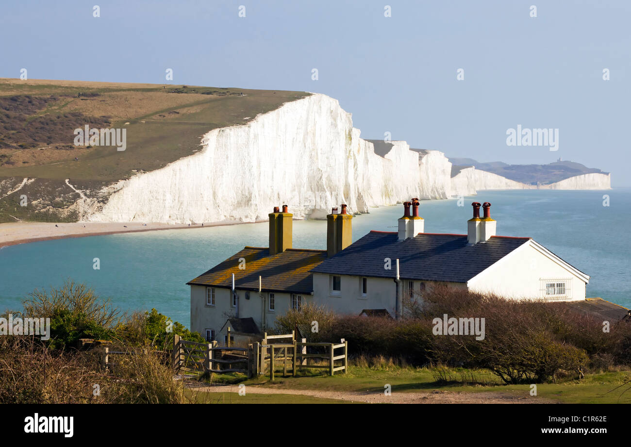 Image of the Coast Guard cottages  with the seven sisters cliffs behind in Sussex, England, UK Stock Photo