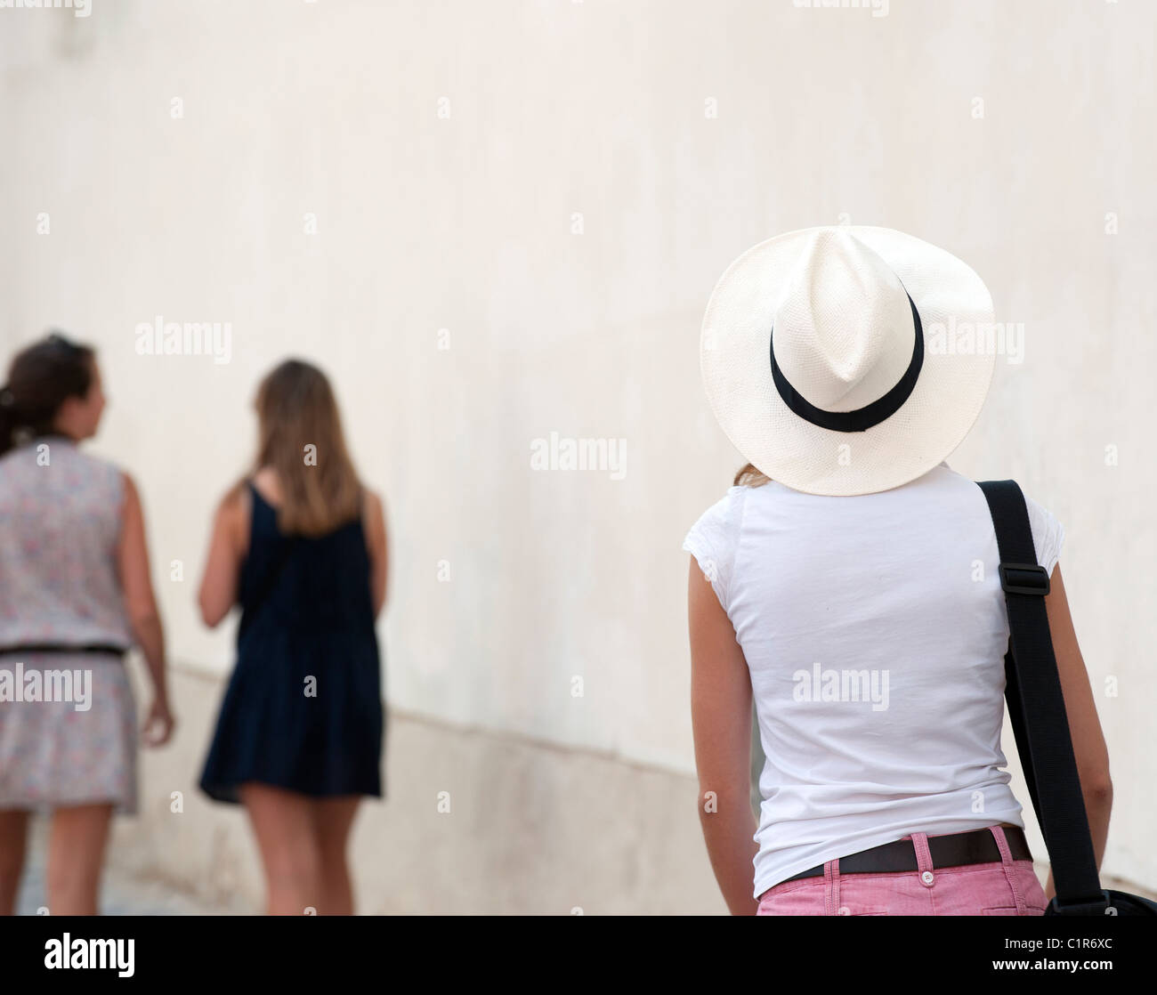Lady with a white hat Stock Photo