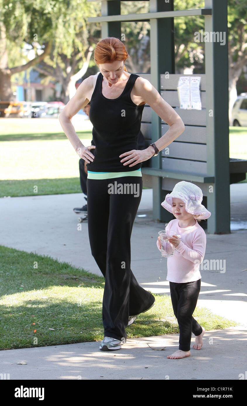 Marcia Cross visits a park in Santa Monica with her twin daughters Eden