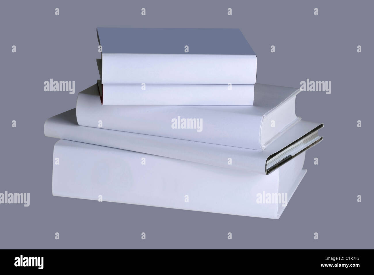 Five white books isolated on a gray Stock Photo