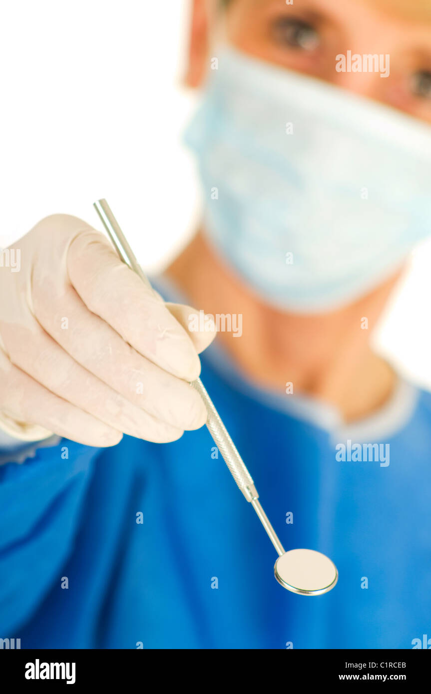 dentist holding dental mirror Stock Photo Alamy