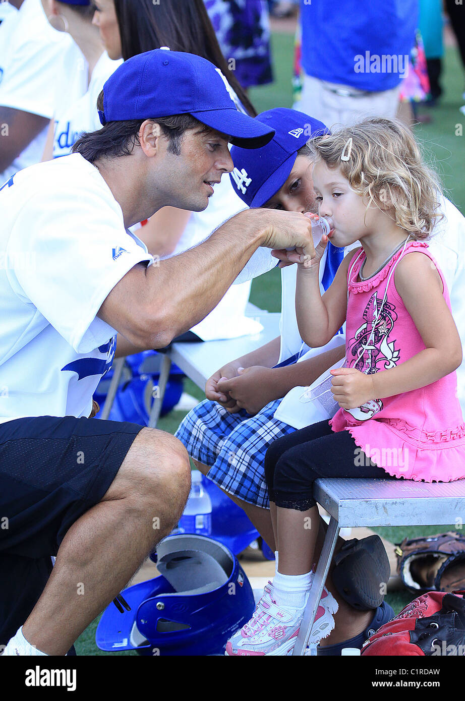 David Charvet and his daughter The Dodger's Stadium hosts a Hollywood Stars Game Night Los Angeles, California - 25.07.09 Stock Photo