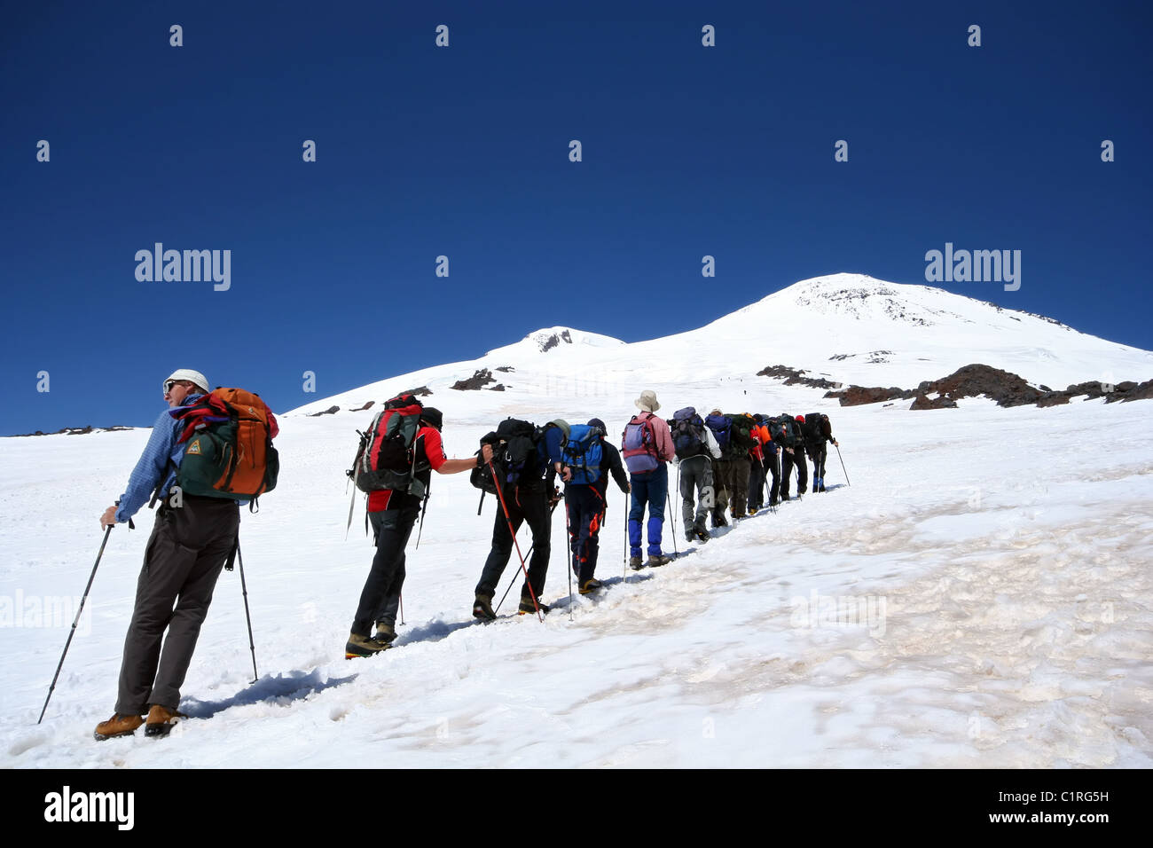 Alpinists at the Elbrus climbing in Caucasus mountains. Caucasus mountains. Russia. Stock Photo