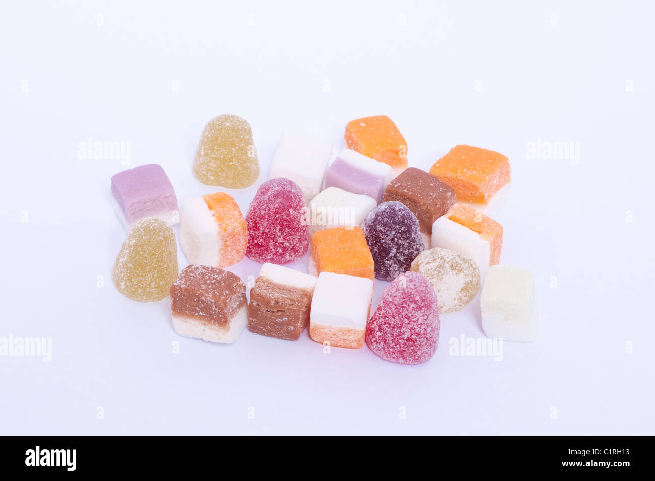 A selection of dolly mixtures traditional sweets on a white background Stock Photo