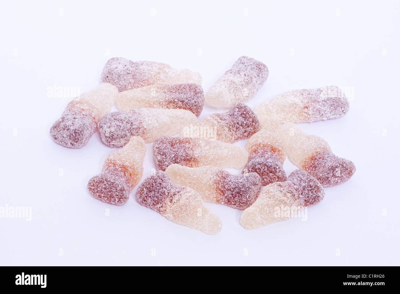 A selection of sugared coke bottles traditional sweets on a white background Stock Photo