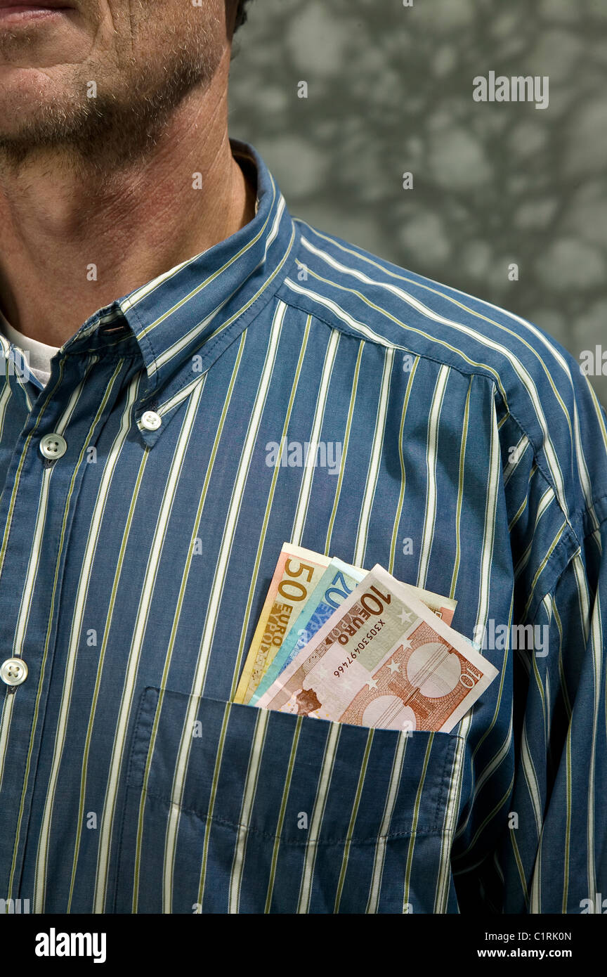 Man with shirt and Euronotes Stock Photo
