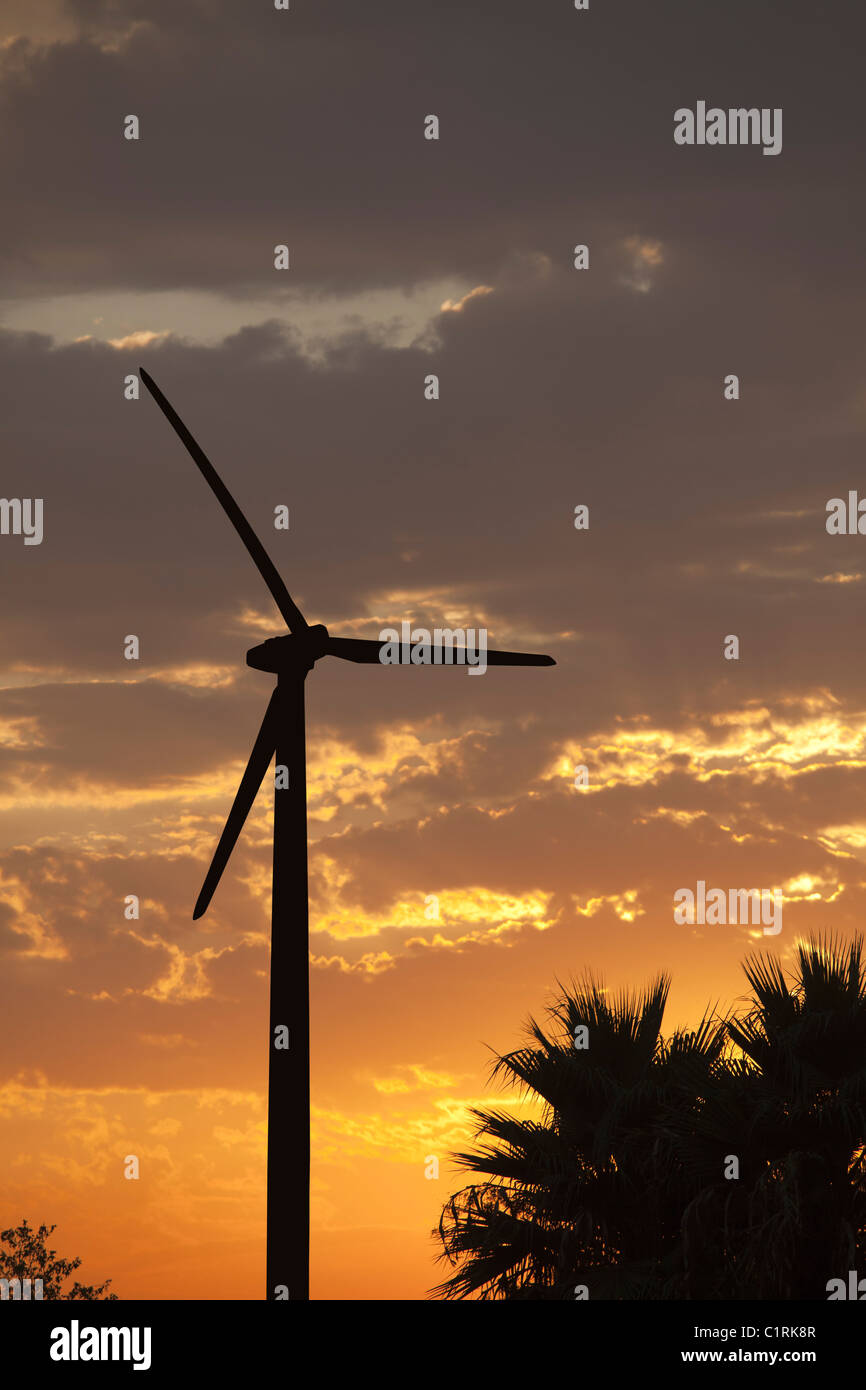 Silhouetted Wind Turbine Over Dramatic Sunset Sky and Clouds Stock ...