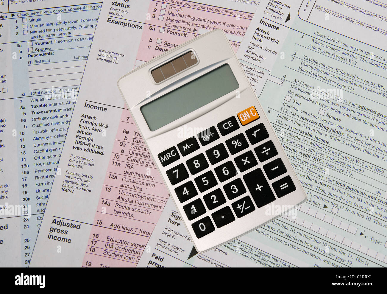 Calculator tax hi-res stock photography and images - Alamy