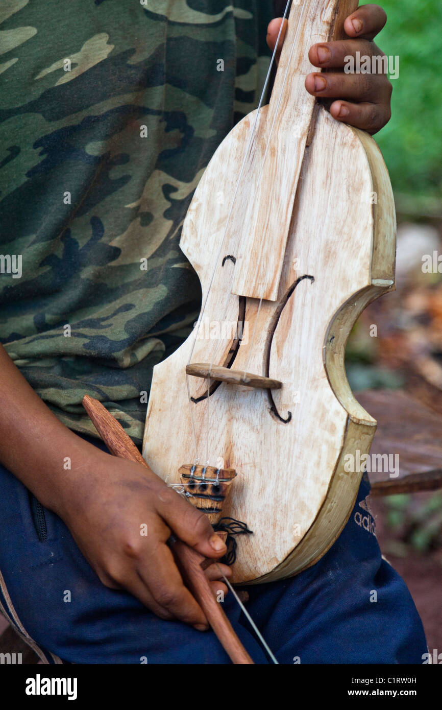A hand-made Guarani 3-string violin (rabe) in San Ignacio, Misiones, Argentina. Stock Photo