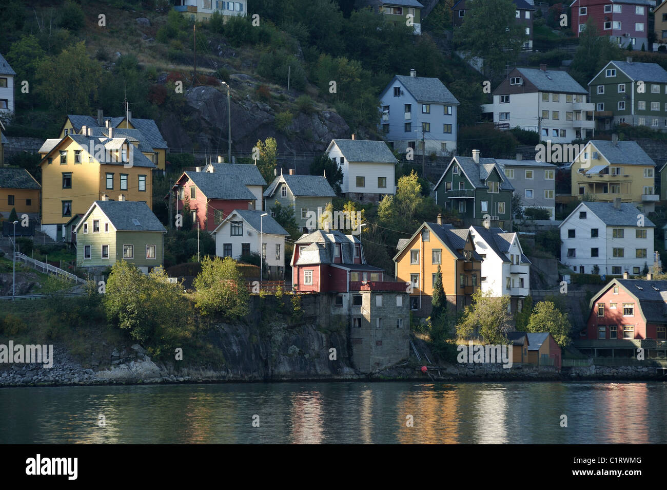 Colourful wooden houses on the mountain slope, Odda Norway Stock Photo