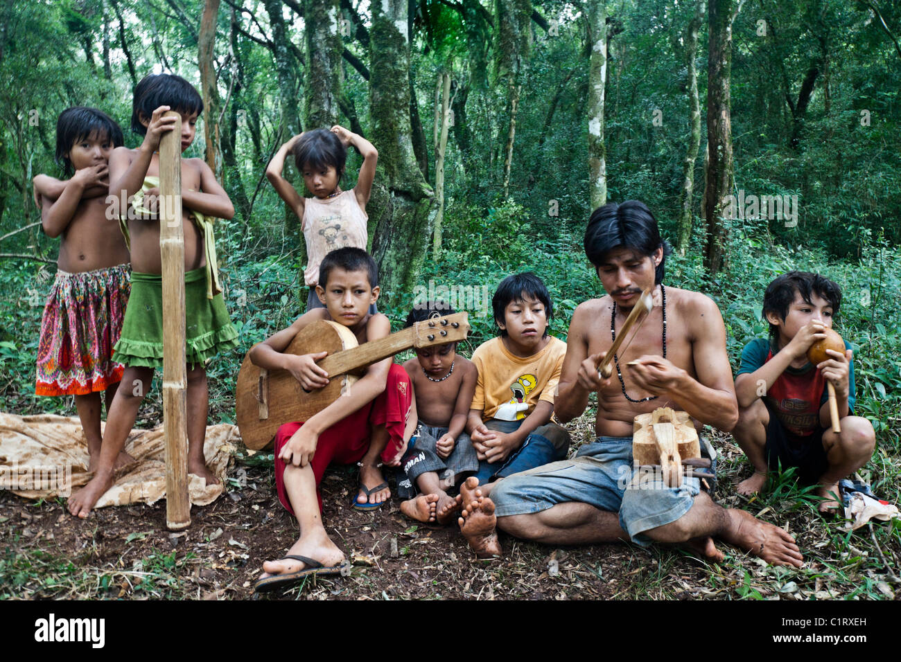 Mbya Guarani residents of aldea Katupyry near San Ignacio, Misiones, Argentina, with traditional hand-made instruments. Stock Photo