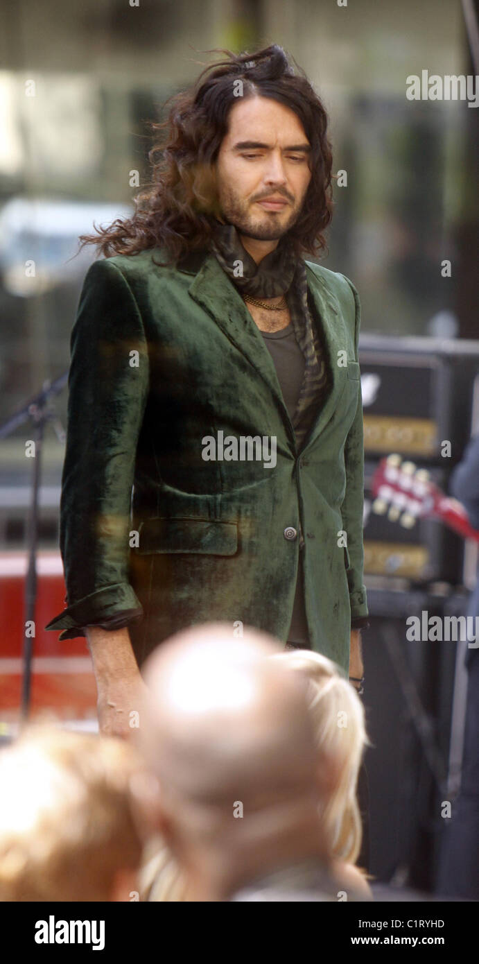 Russell Brand as character Aldous Snow, filming the movie, 'Get Him to The Greek' at Rockefeller Plaza New York City, USA - Stock Photo