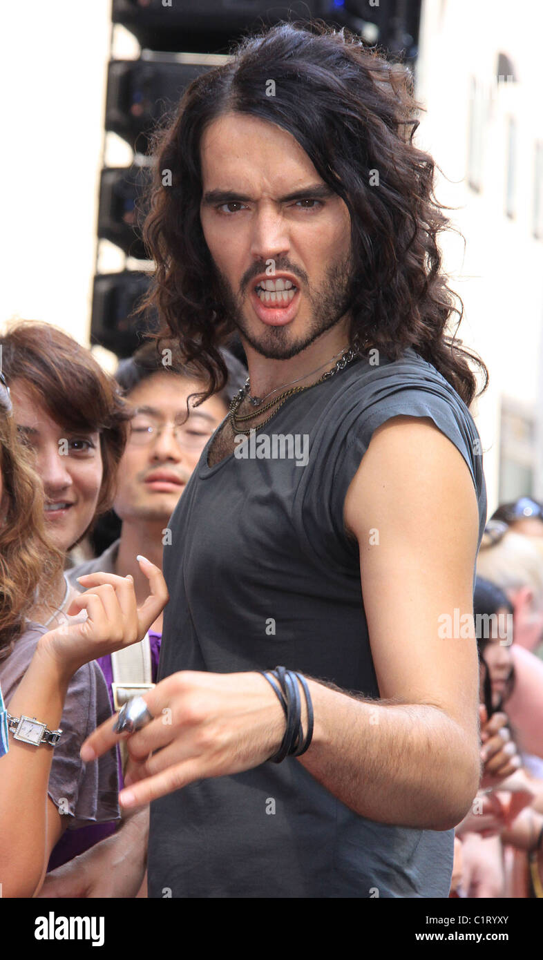 Russell Brand as character Aldous Snow, filming the movie, 'Get Him to The  Greek' at Rockefeller Plaza New York City, USA Stock Photo - Alamy