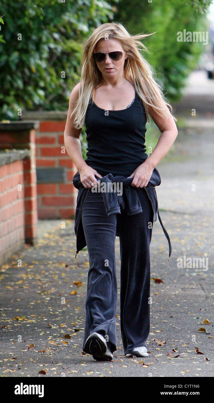 Geri Halliwell out walking near her home in a velour tracksuit and