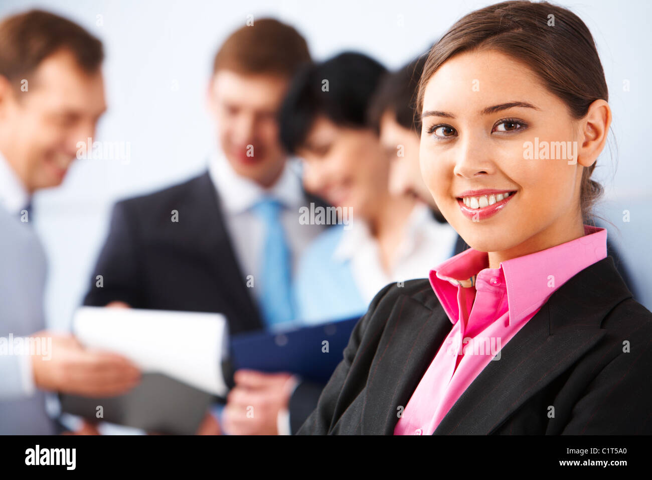 Photo of pretty business leader looking at camera in working ...