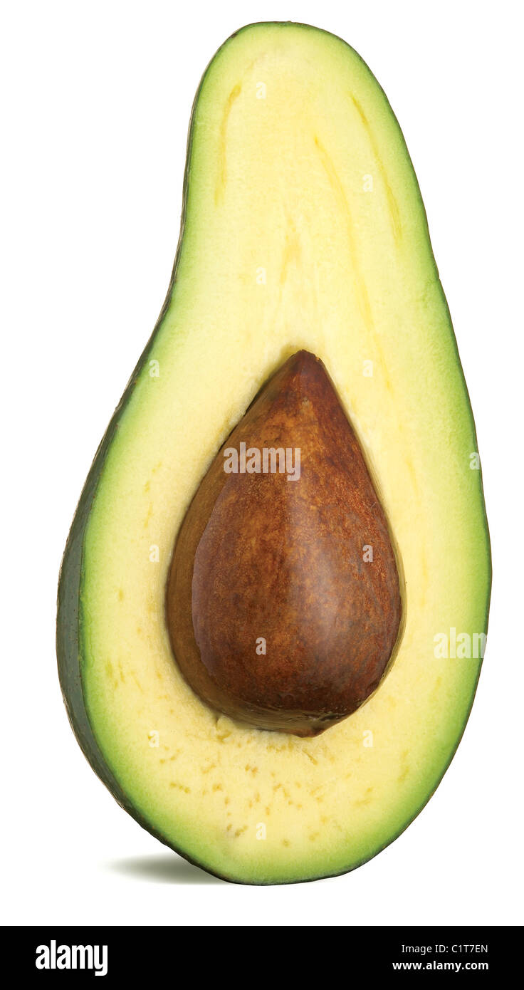 a half of an avocado with stone isolated on a white background with clipping path Stock Photo