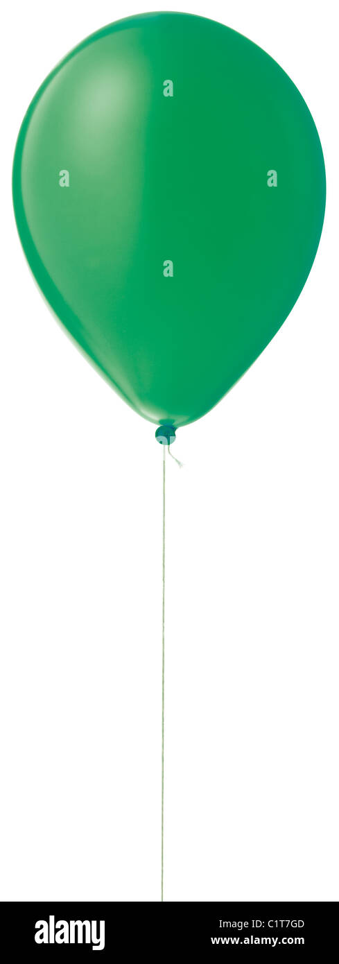 a green helium balloon on a string isolated with a clipping path Stock Photo