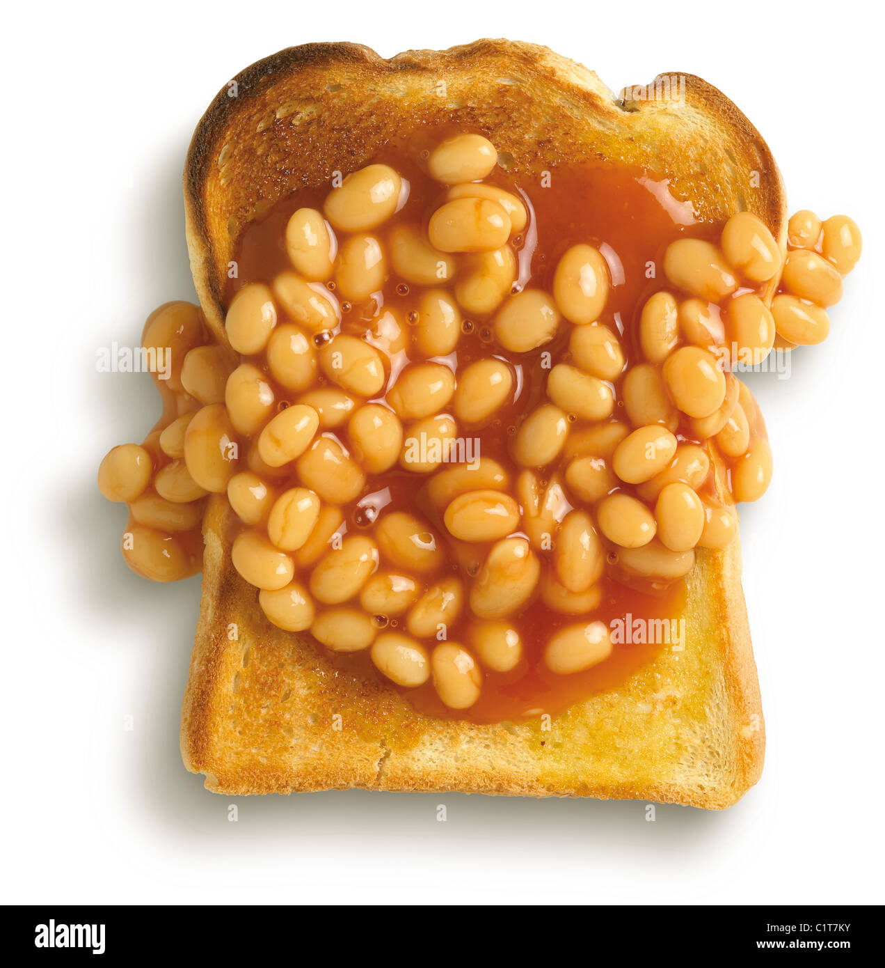 an overhead view of beans on toast isolated on a white background with clipping path Stock Photo