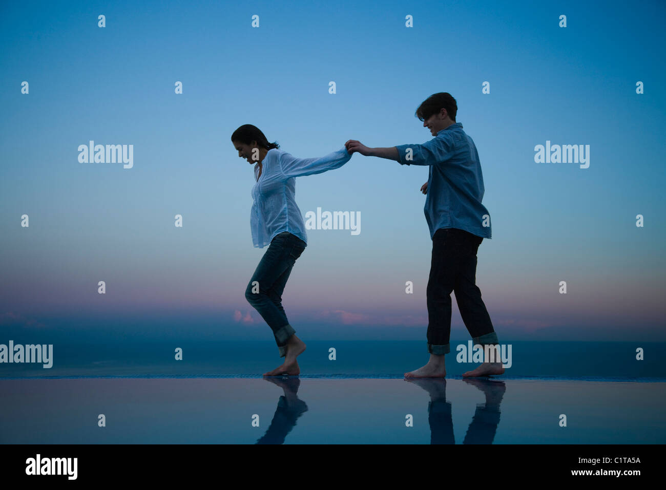 People Walking Pool Holding Hands High Resolution Stock Photography and