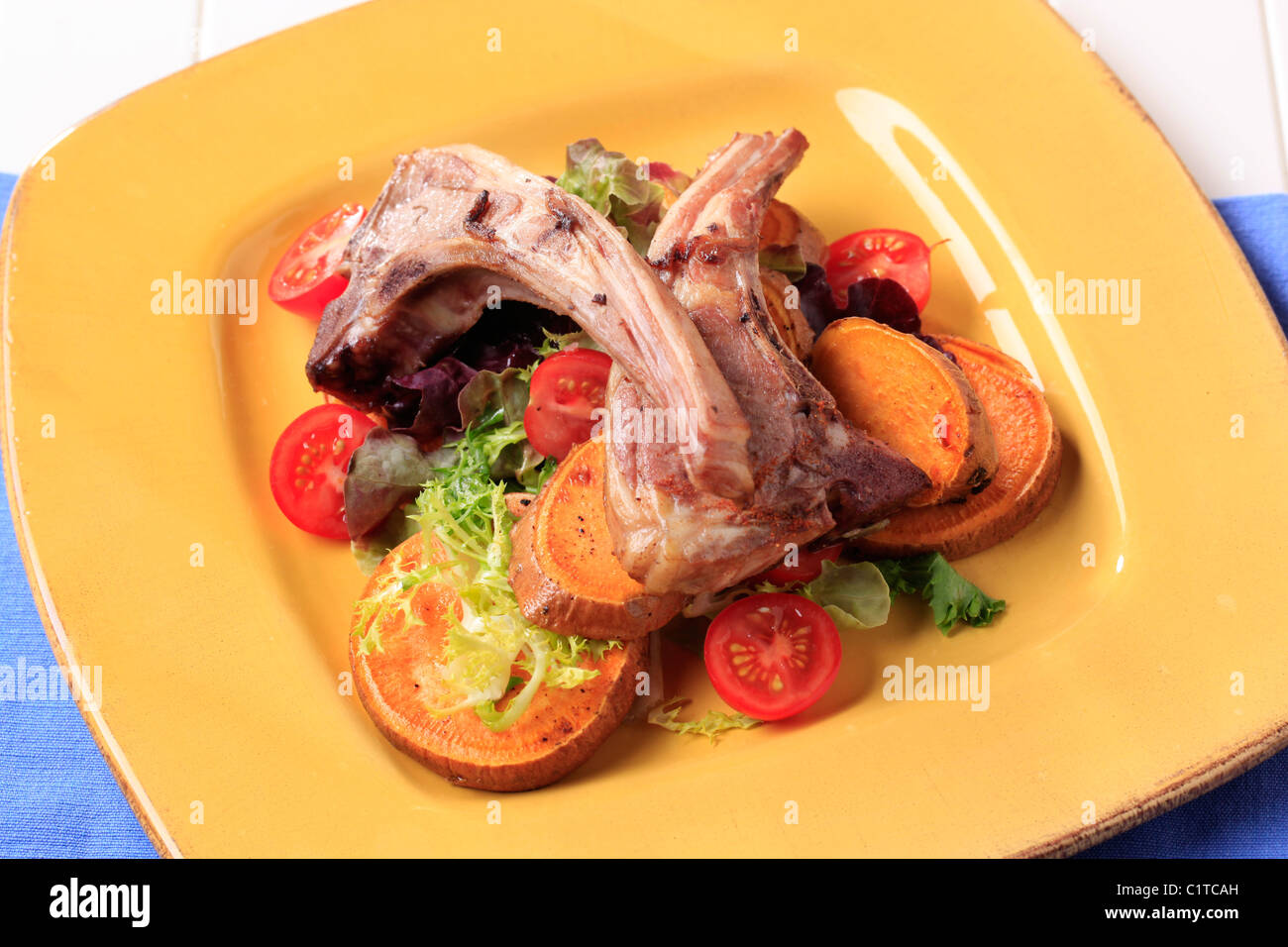Roast lamb chops and potatoes still Stock Photo Alamy