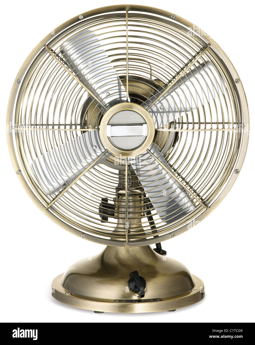 retro style silver and brass office fan isolated on a white background