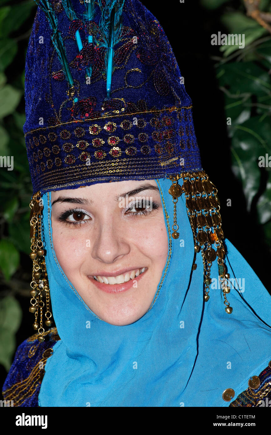 Portrait of a young women wearing traditional costume of Kazakhstan. No third party rights available. ( NO MR ) | Stock Photo