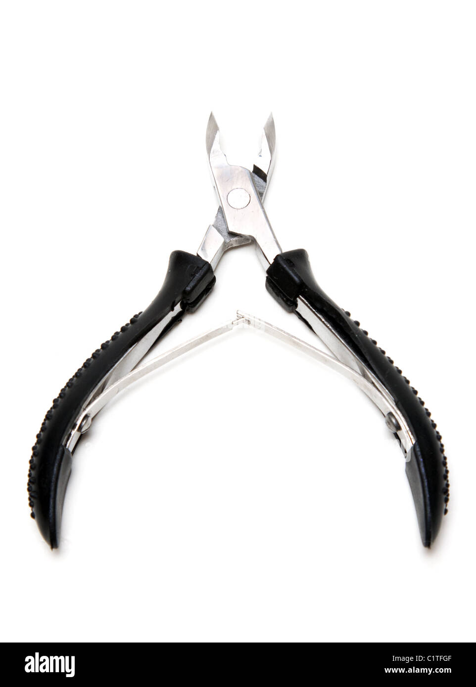 Manicure scissors with black handle on white background Stock Photo