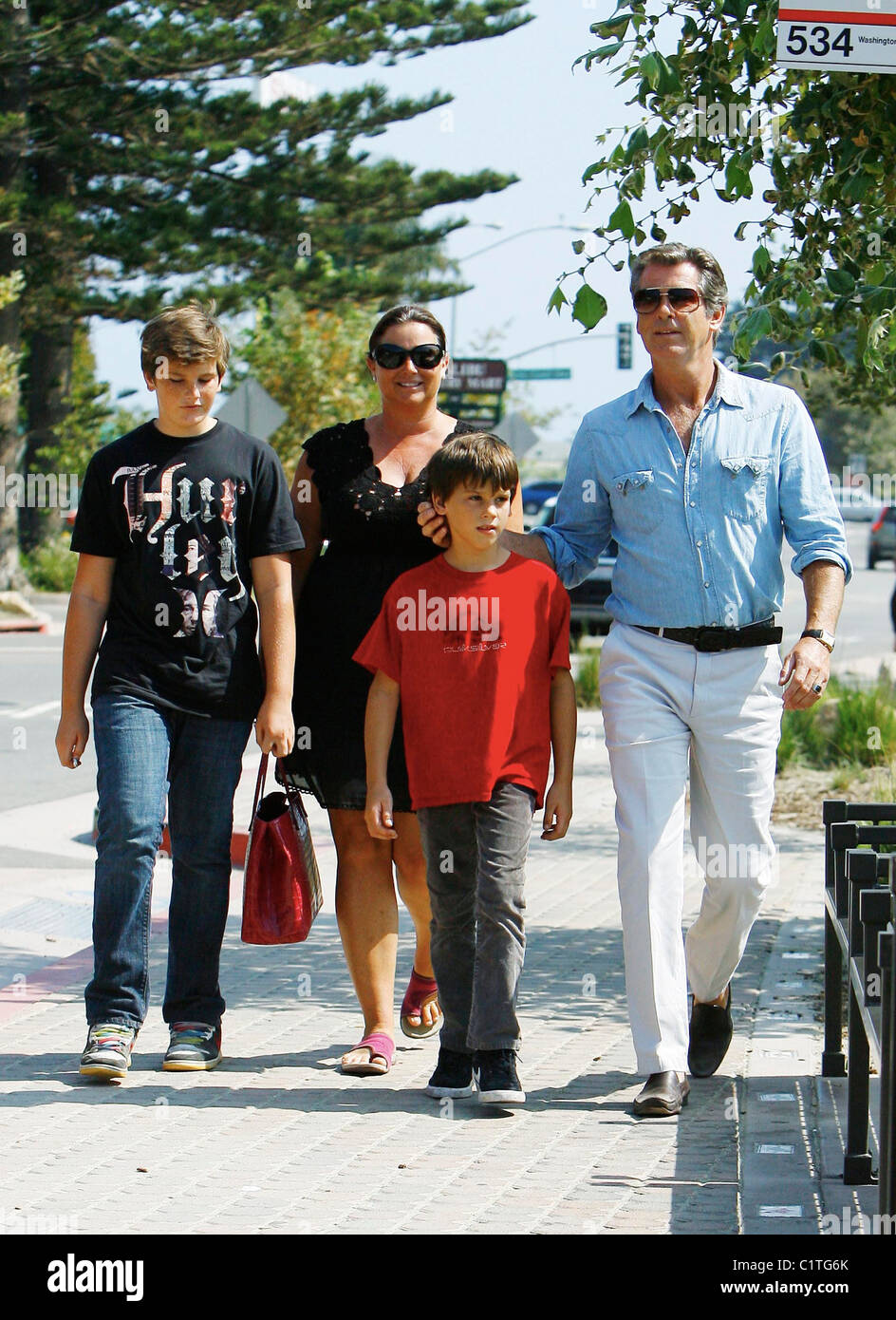 Pierce Brosnan having lunch with his family, sons Dylan and Paris, and