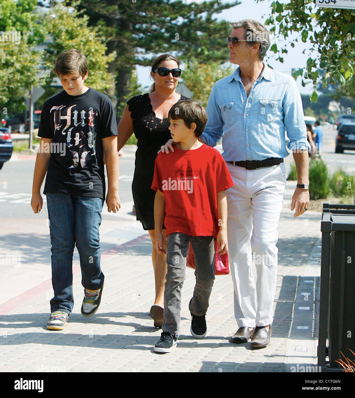 Pierce Brosnan having lunch with his family, sons Dylan and Paris, and