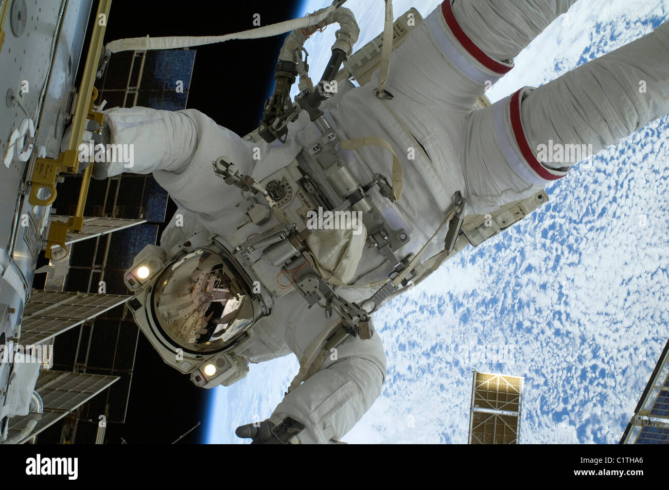 Astronaut participates in a session of extravehicular activity. Stock Photo