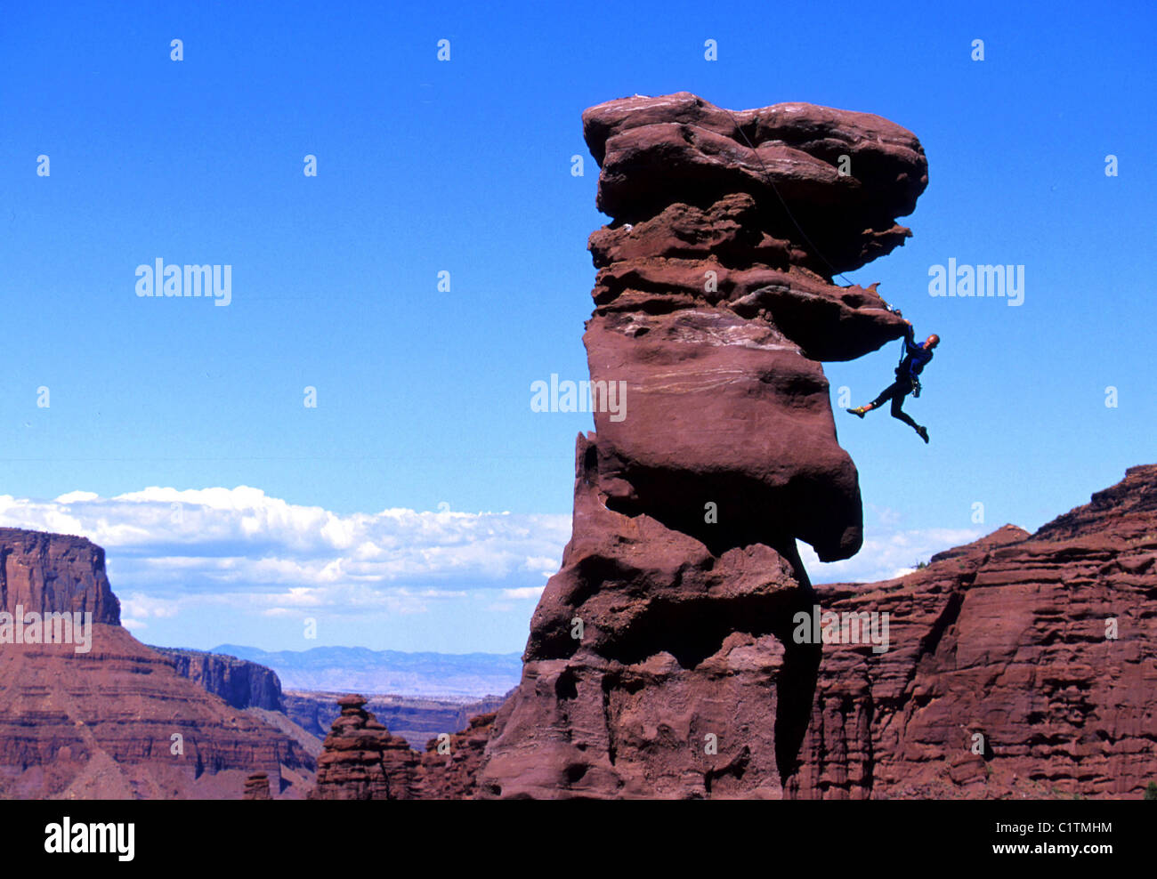 Young adult man mountain climbing, Utah, USA Stock Photo Alamy