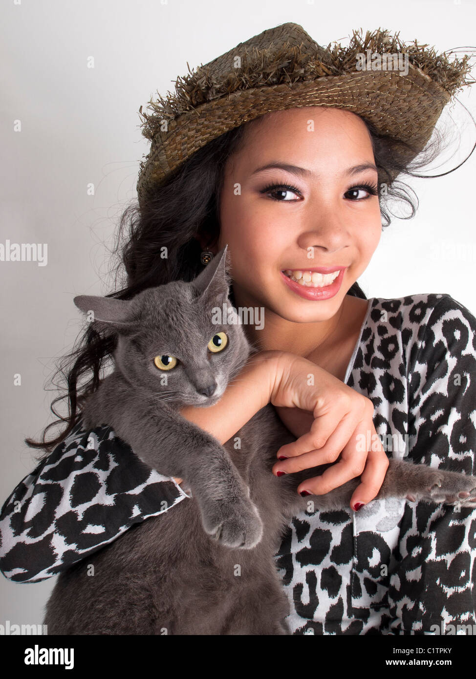 A cute girl with Korat cat Stock Photo