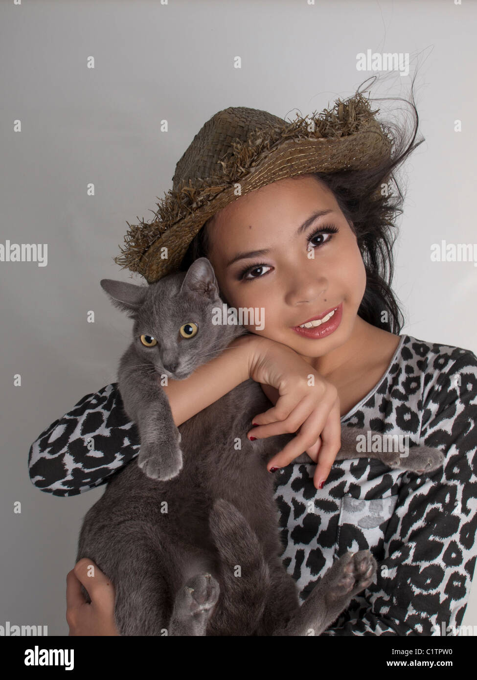 A cute girl with Korat cat Stock Photo