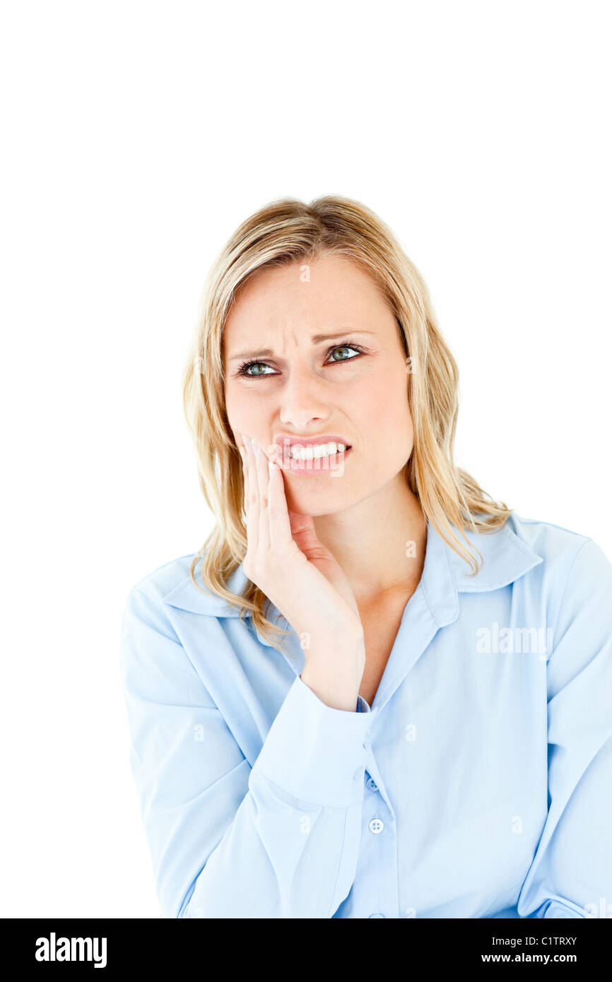 Dejected businesswoman with toothache Stock Photo